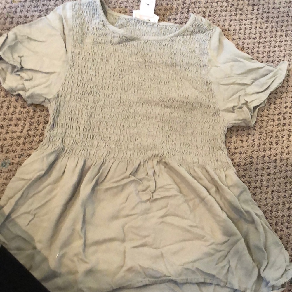 Light green peplum shirt